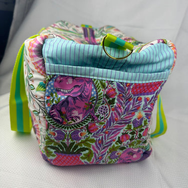 Neon dino duffel bag