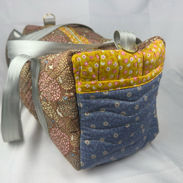 Muted floral duffel bag